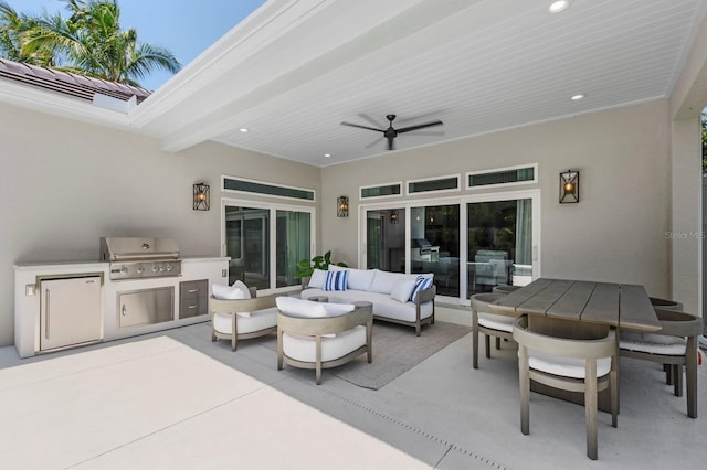 view of patio with ceiling fan, area for grilling, an outdoor hangout area, and a grill