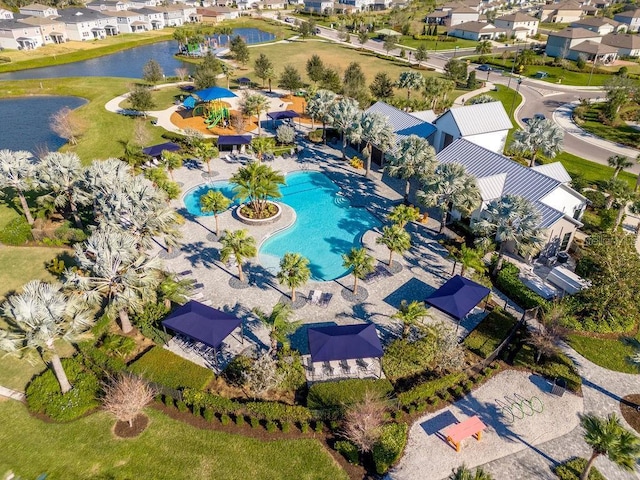 birds eye view of property featuring a water view