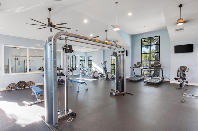 workout area featuring vaulted ceiling