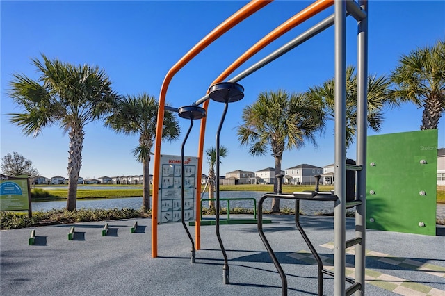 view of playground featuring a water view