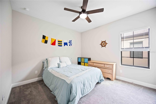 carpeted bedroom with ceiling fan