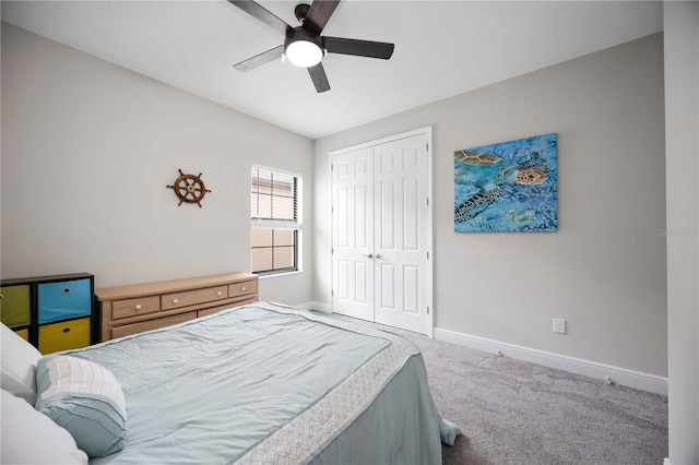 bedroom with carpet, a closet, and ceiling fan