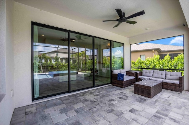 view of patio / terrace featuring ceiling fan and outdoor lounge area