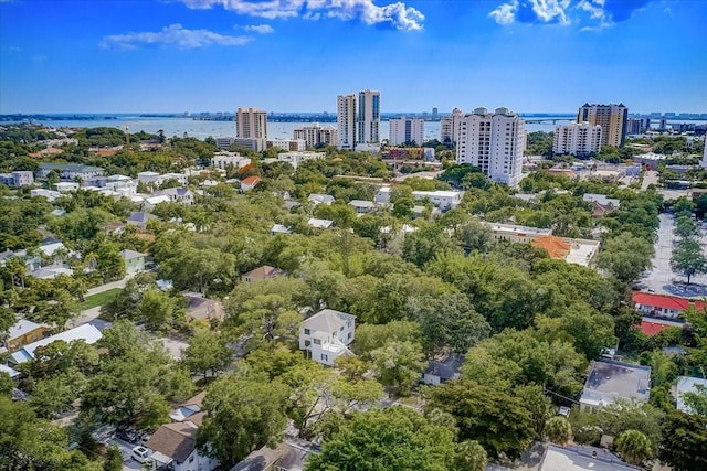 drone / aerial view with a water view and a city view