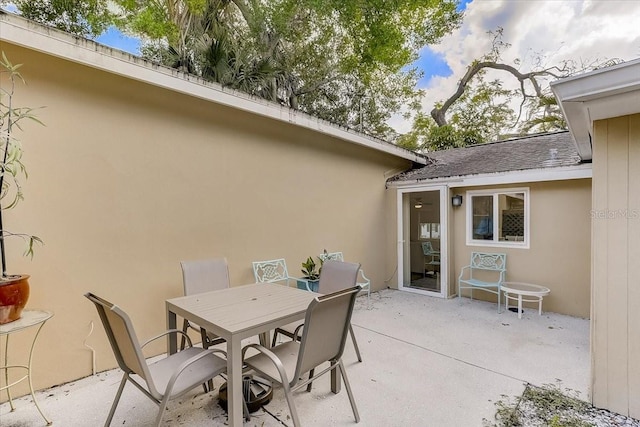 view of patio with outdoor dining area