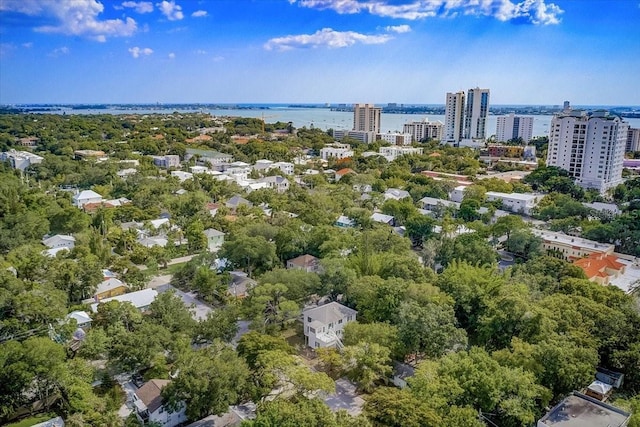 bird's eye view featuring a water view and a view of city
