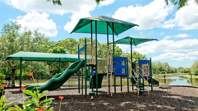 view of play area with a water view