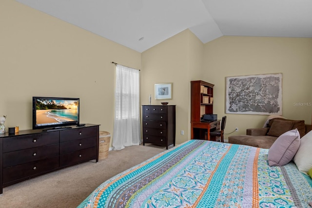 bedroom with lofted ceiling and light colored carpet