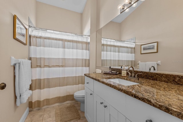 full bathroom featuring toilet, tile patterned flooring, and vanity