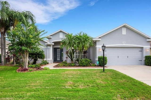 ranch-style home with a front lawn and a garage