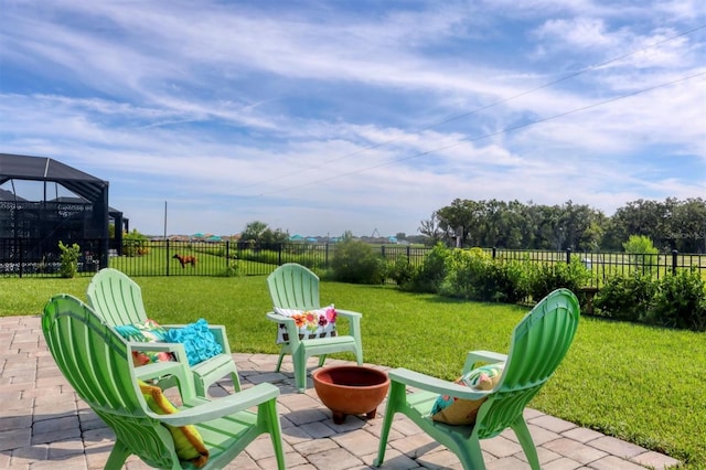 view of patio / terrace featuring an outdoor fire pit