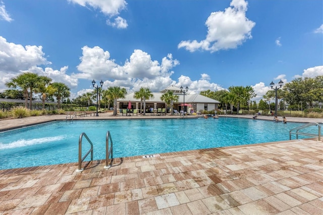 view of pool featuring a patio area