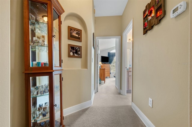 corridor with carpet floors