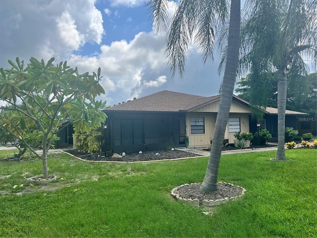 view of home's exterior featuring a yard