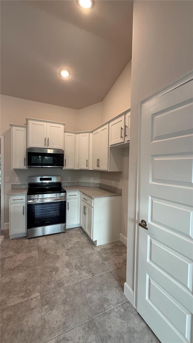 kitchen featuring white cabinets and stainless steel appliances