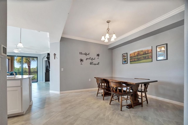 tiled dining space featuring crown molding, sink, and a notable chandelier