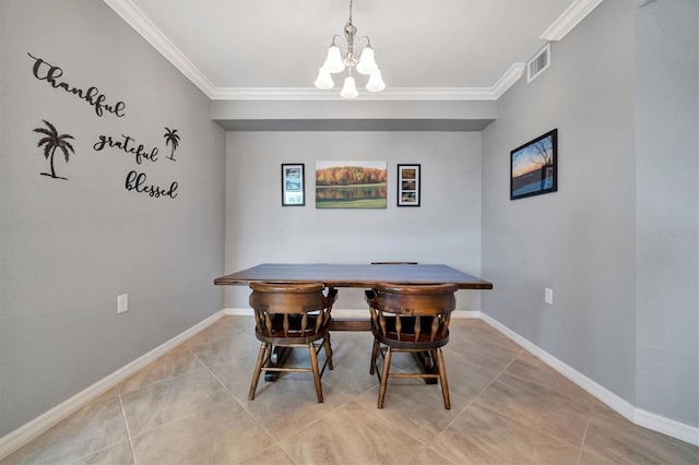 tiled dining area featuring ornamental molding and a chandelier