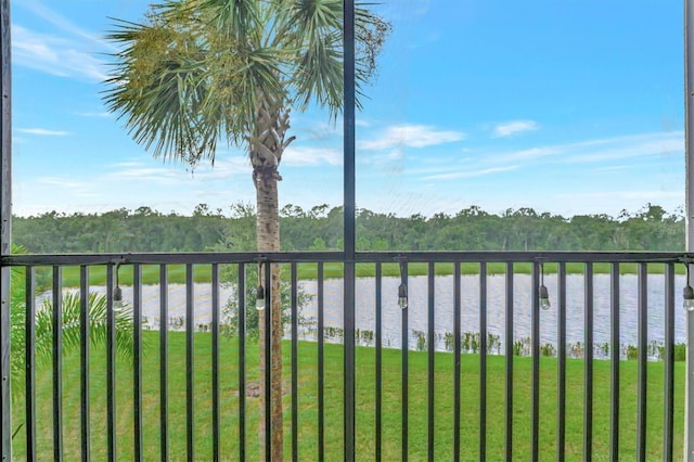 balcony featuring a water view