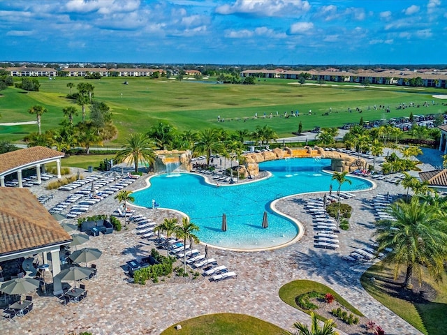 view of pool with pool water feature