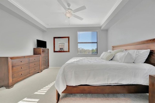 bedroom with ornamental molding, light carpet, and ceiling fan