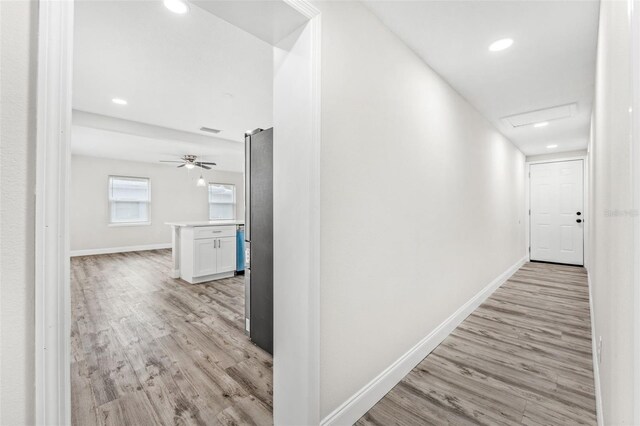 hallway featuring light wood-type flooring