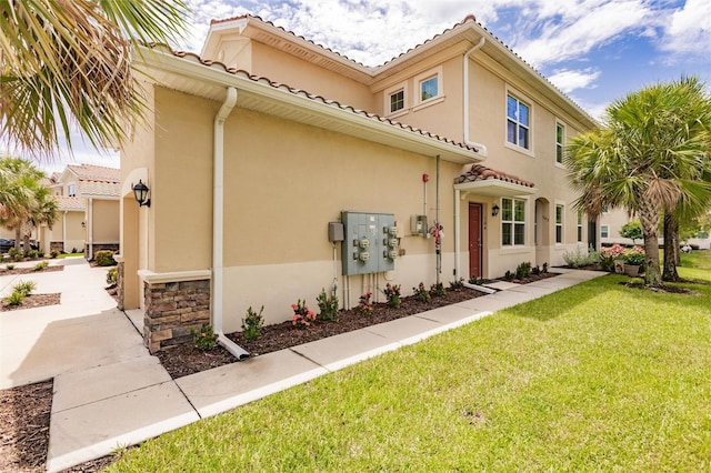 exterior space with a lawn