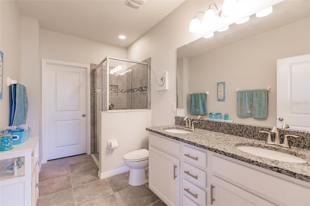 bathroom with a shower with door, vanity, a chandelier, and toilet