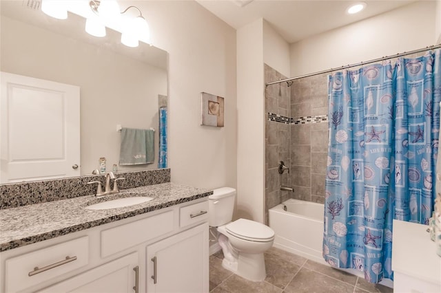 full bathroom featuring vanity, tile patterned flooring, shower / bath combination with curtain, and toilet