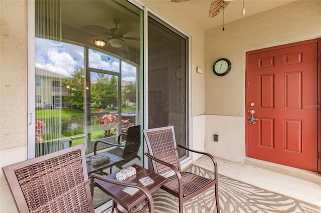 property entrance featuring ceiling fan