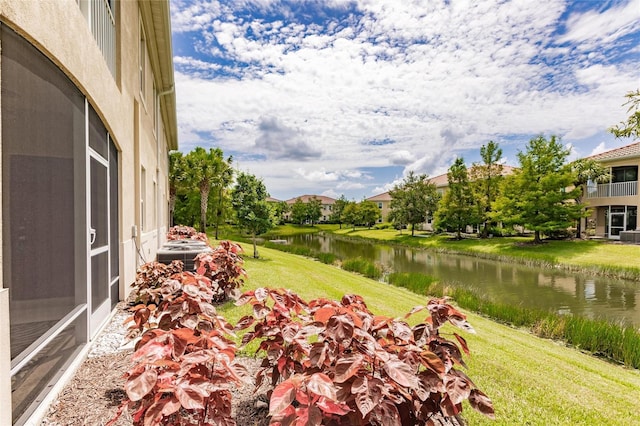 view of yard with a water view