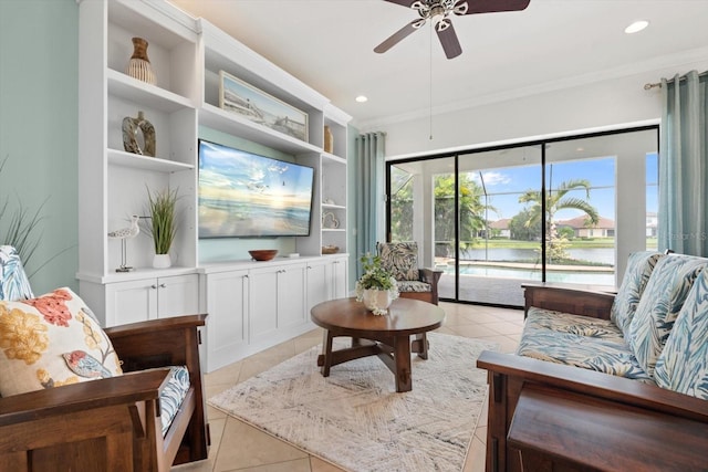 tiled living room featuring crown molding and ceiling fan