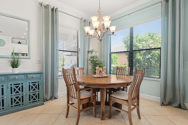 tiled dining room with an inviting chandelier, crown molding, and a healthy amount of sunlight