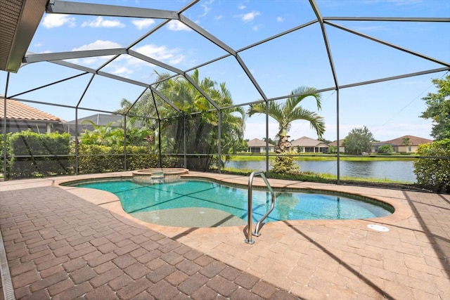 view of swimming pool featuring glass enclosure, a water view, a patio area, and an in ground hot tub