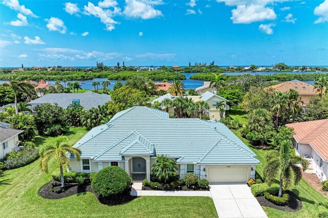 drone / aerial view with a water view