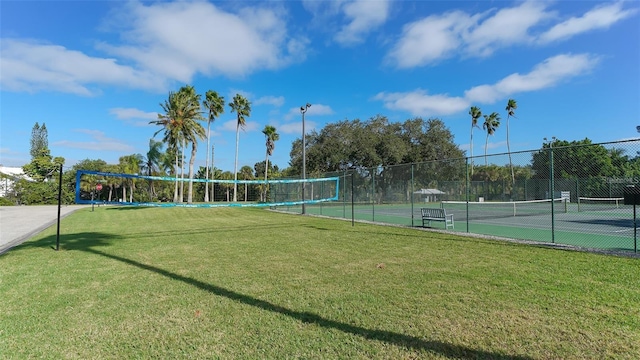 view of property's community with a yard