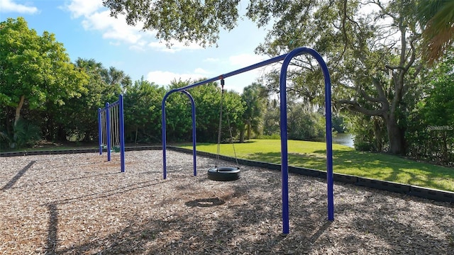 view of jungle gym featuring a yard