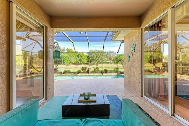 view of patio / terrace with glass enclosure