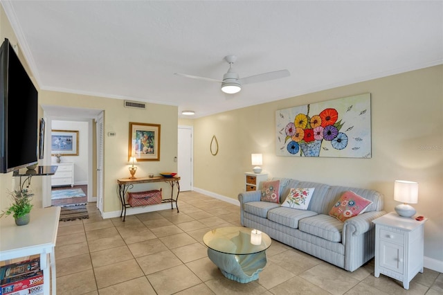 living room featuring light tile patterned floors, crown molding, and ceiling fan