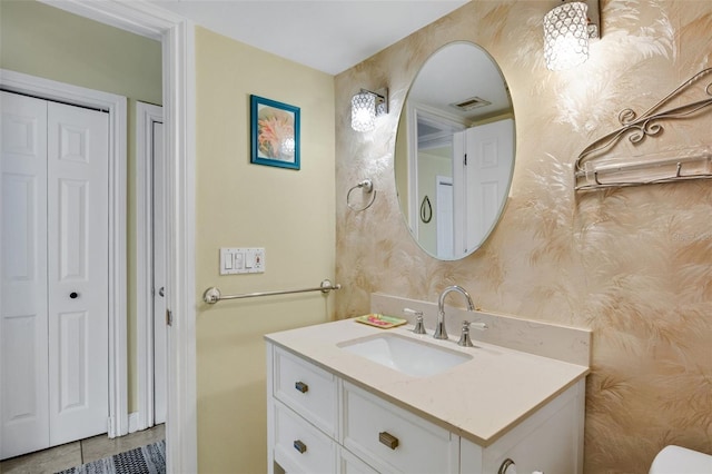 bathroom with vanity and tile patterned flooring