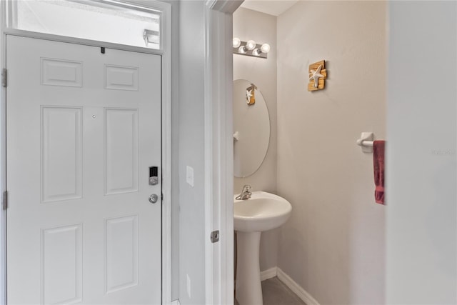 bathroom featuring baseboards