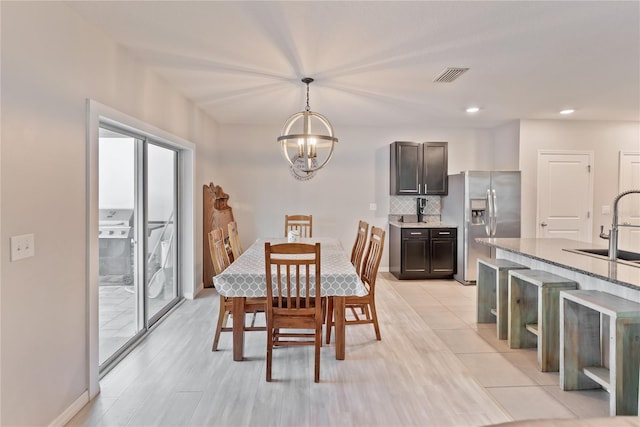 dining room featuring recessed lighting, baseboards, visible vents, a chandelier, and light tile patterned flooring