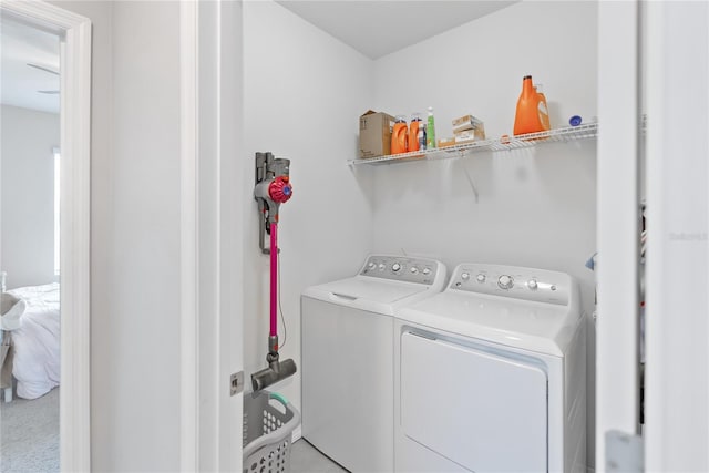 washroom with laundry area and washer and clothes dryer