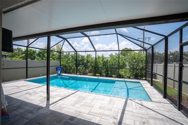 view of pool featuring a patio, a fenced backyard, a lanai, and a fenced in pool