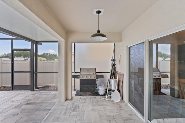 sunroom / solarium featuring plenty of natural light