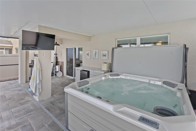 interior space featuring a hot tub