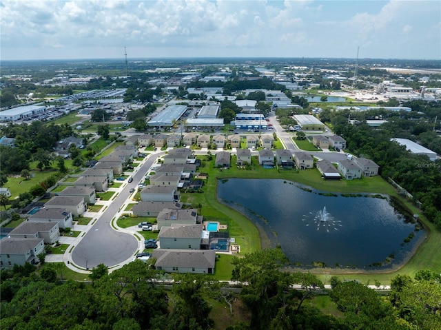 aerial view with a residential view and a water view