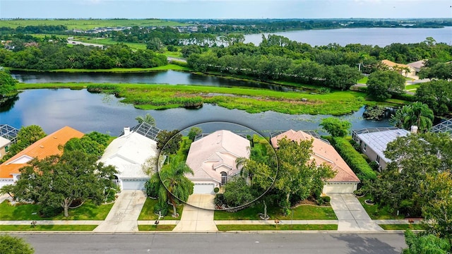 drone / aerial view with a water view