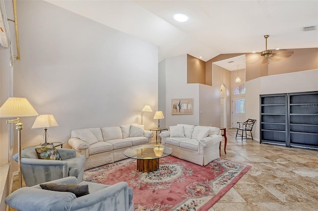 living room featuring high vaulted ceiling and ceiling fan