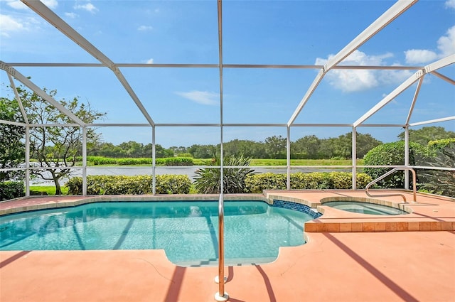 view of swimming pool with a lanai, a water view, and an in ground hot tub