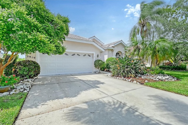 view of front of home with a garage